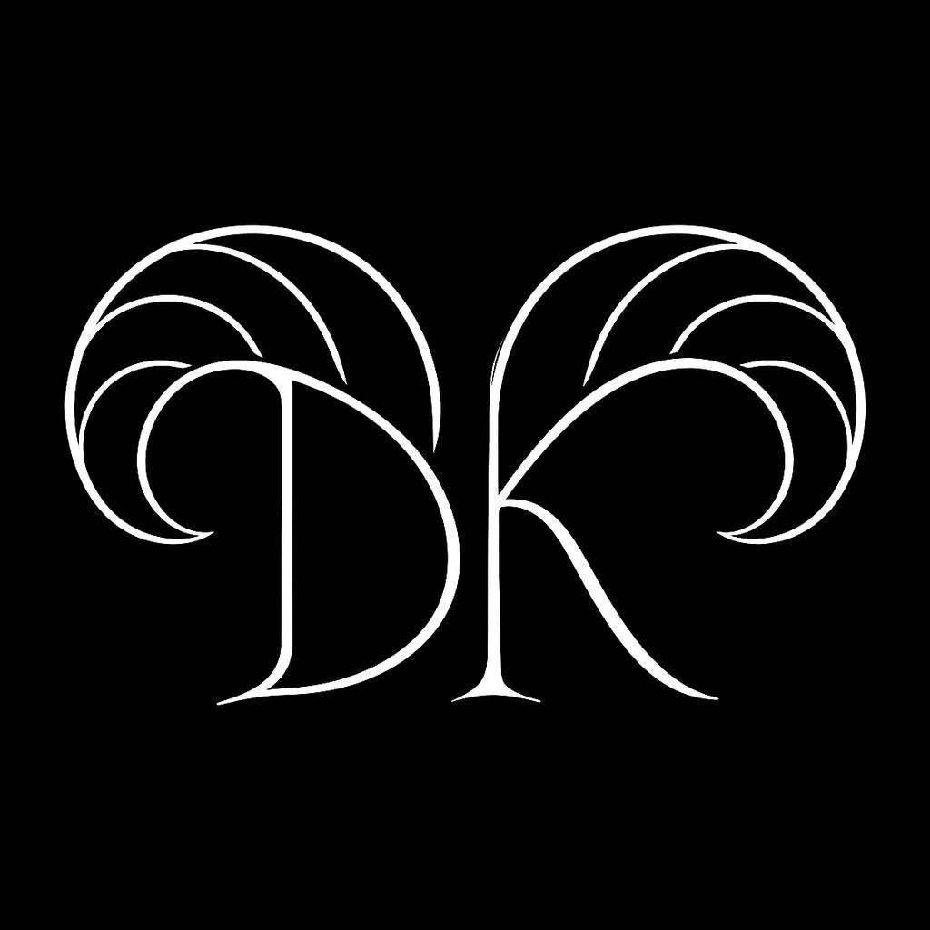 Keep Dreaming Aries approved mark — DK brand logo with Aries ram horns white on black