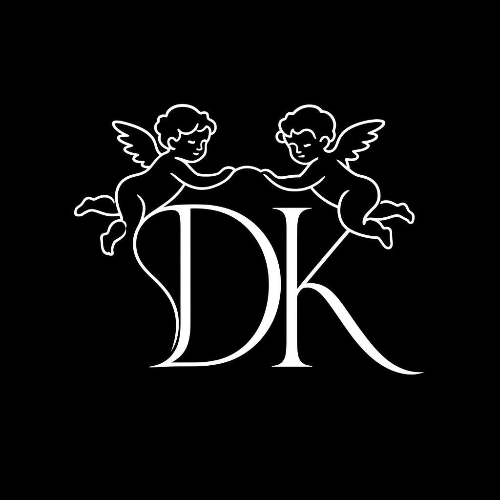 Keep Dreaming Gemini approved mark — DK monogram with Renaissance cherubs white on black