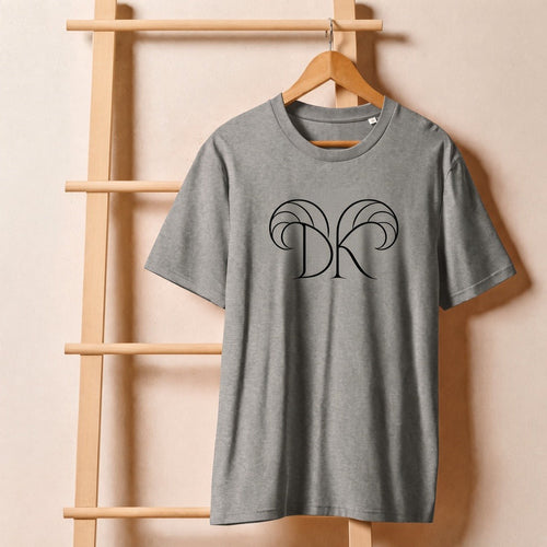 Keep Dreaming Aries Zodiac Tee front — approved DK brand logo with Aries horns on heather grey