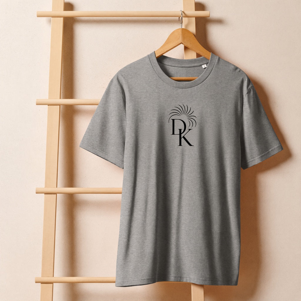 Keep Dreaming Leo Zodiac Tee — front DK monogram + Leo on heather grey